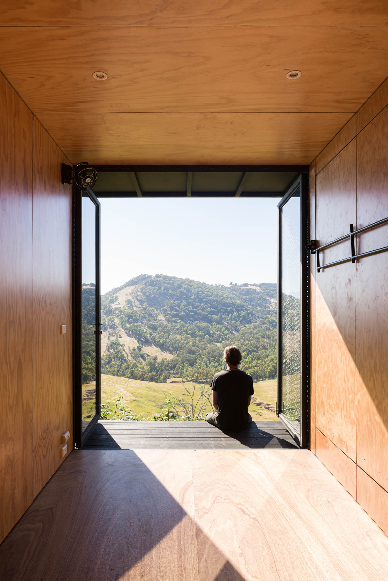 looking out Mansfield Tiny Home / Robbie Walker