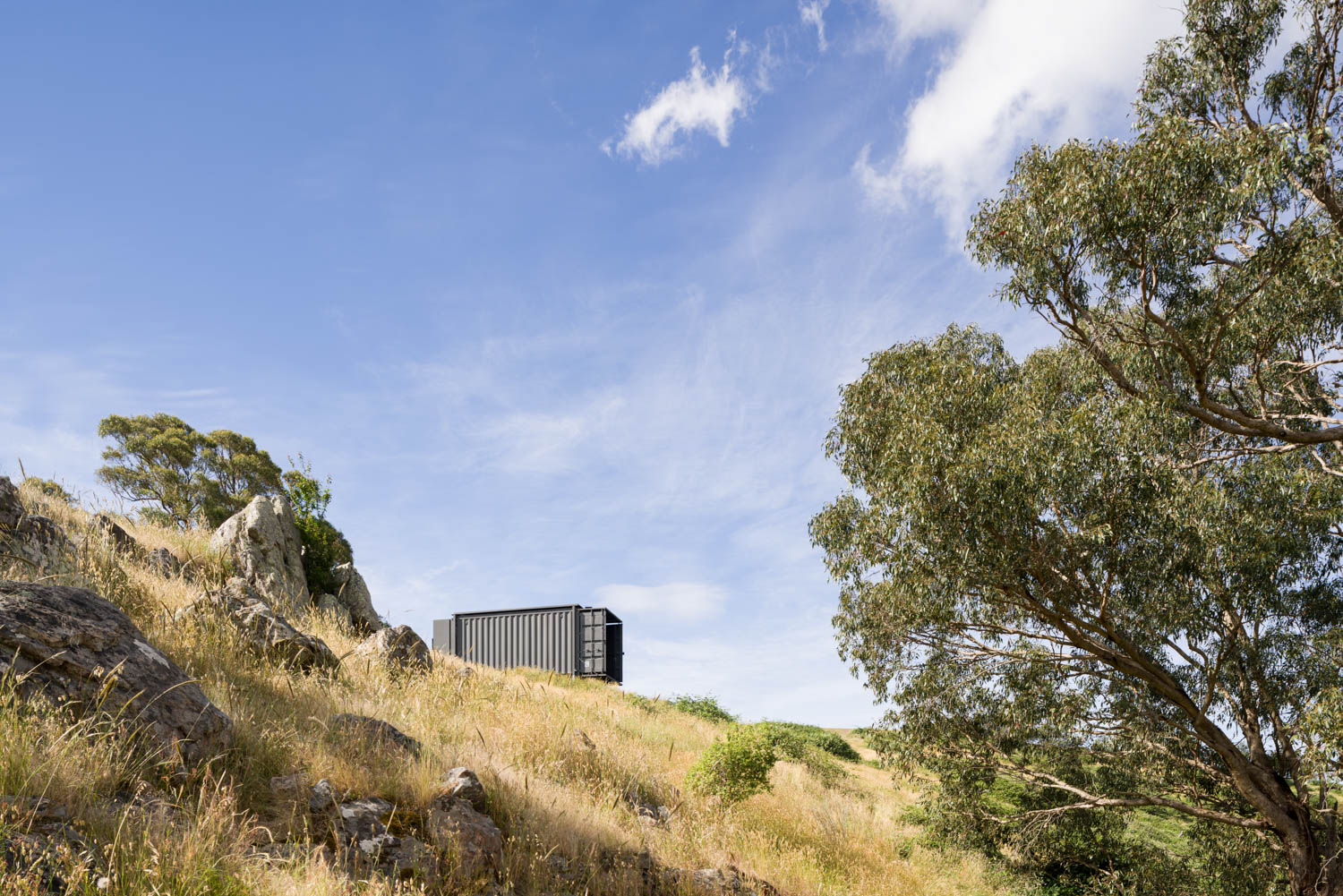 perched on hill Mansfield Tiny Home / Robbie Walker